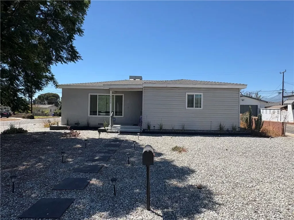 Property Photo:  8568 Evergreen  CA 92335 