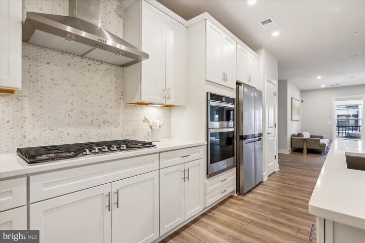 Property Photo:  104 Saint Ives Place 209  MD 20745 