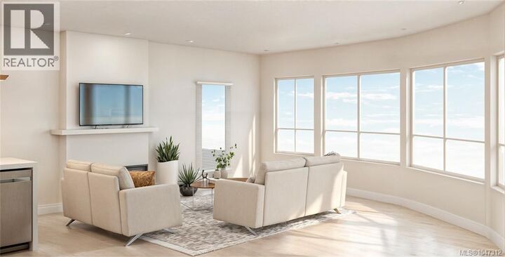 Property Photo:  7815 Wallace Drive 602  BC V8M 2B1 