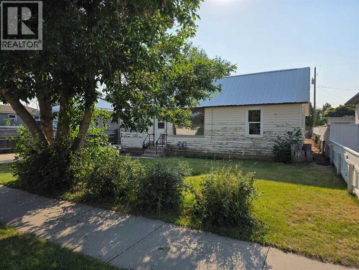 Property Photo: 5906 54 Street AB T1G 1K3