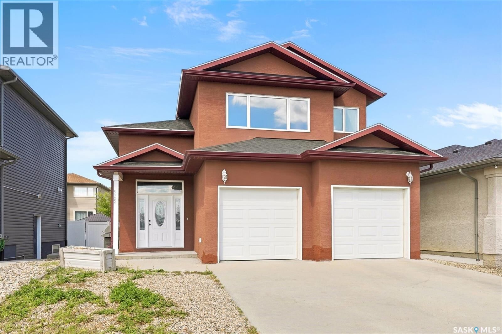 Property Photo: 5022 Tutor Way SK S4W 0G4