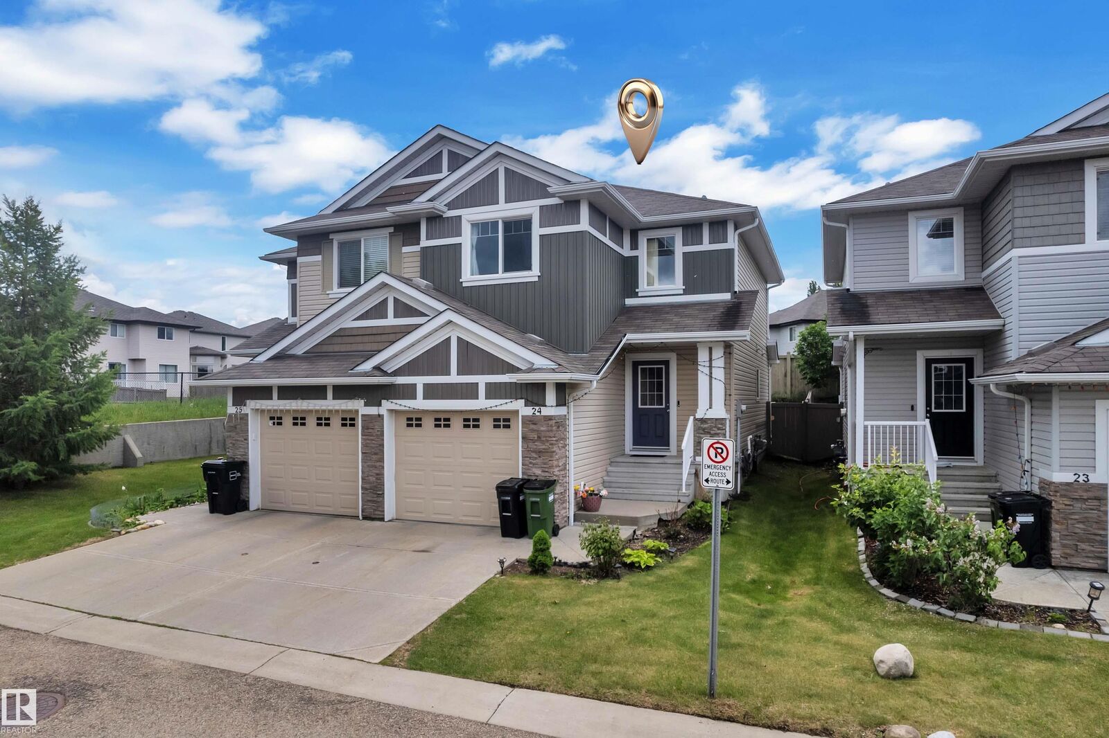 Property Photo: 655 Tamarack Road NW 24 AB T6T 0N4
