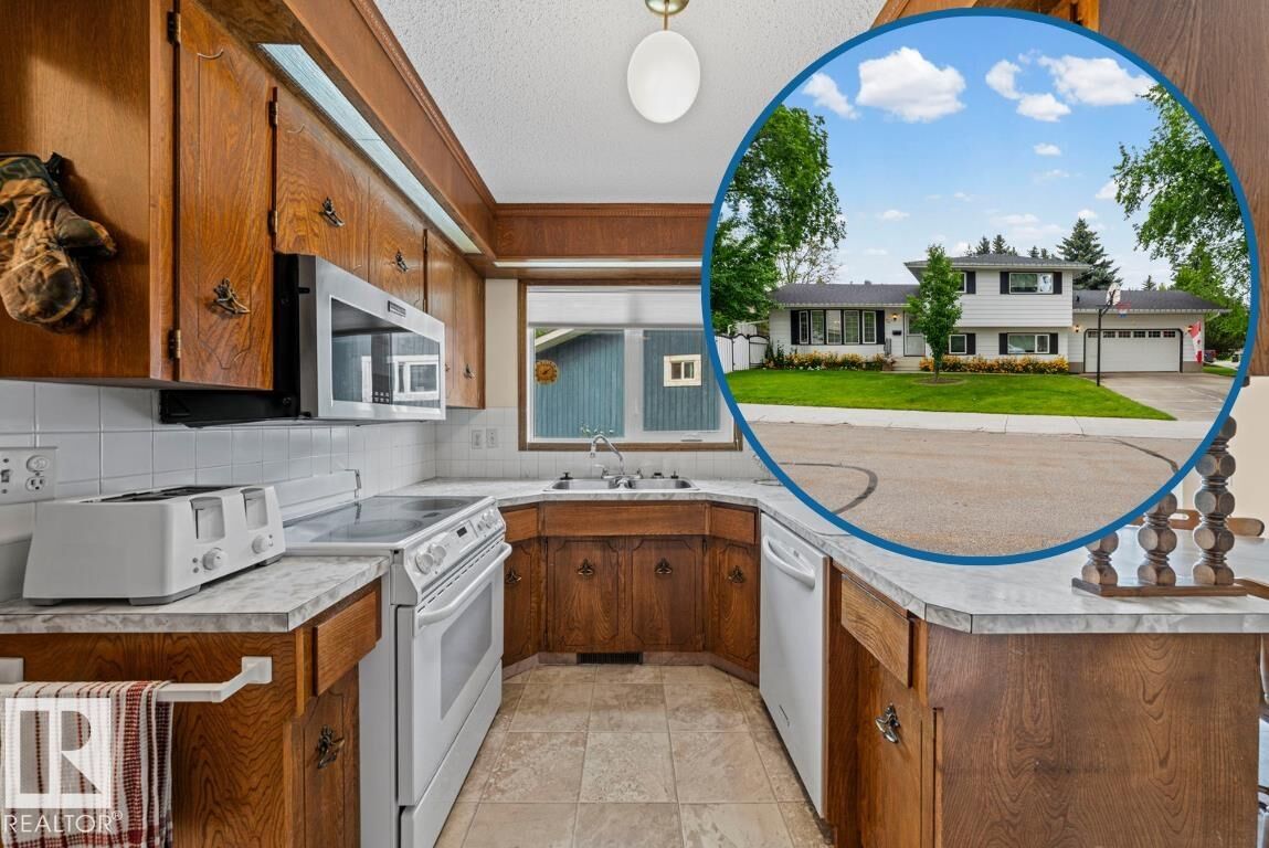Property Photo:  4 Woodlake Road  AB T8A 4B2 