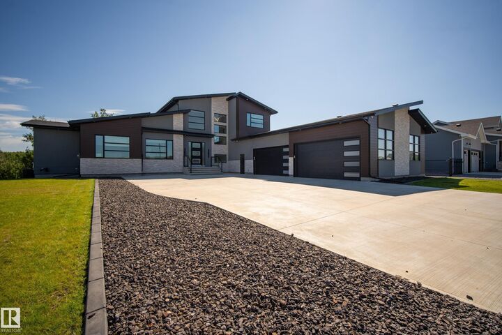 Property Photo: 52 Harvest Crescent AB T8E 0A3