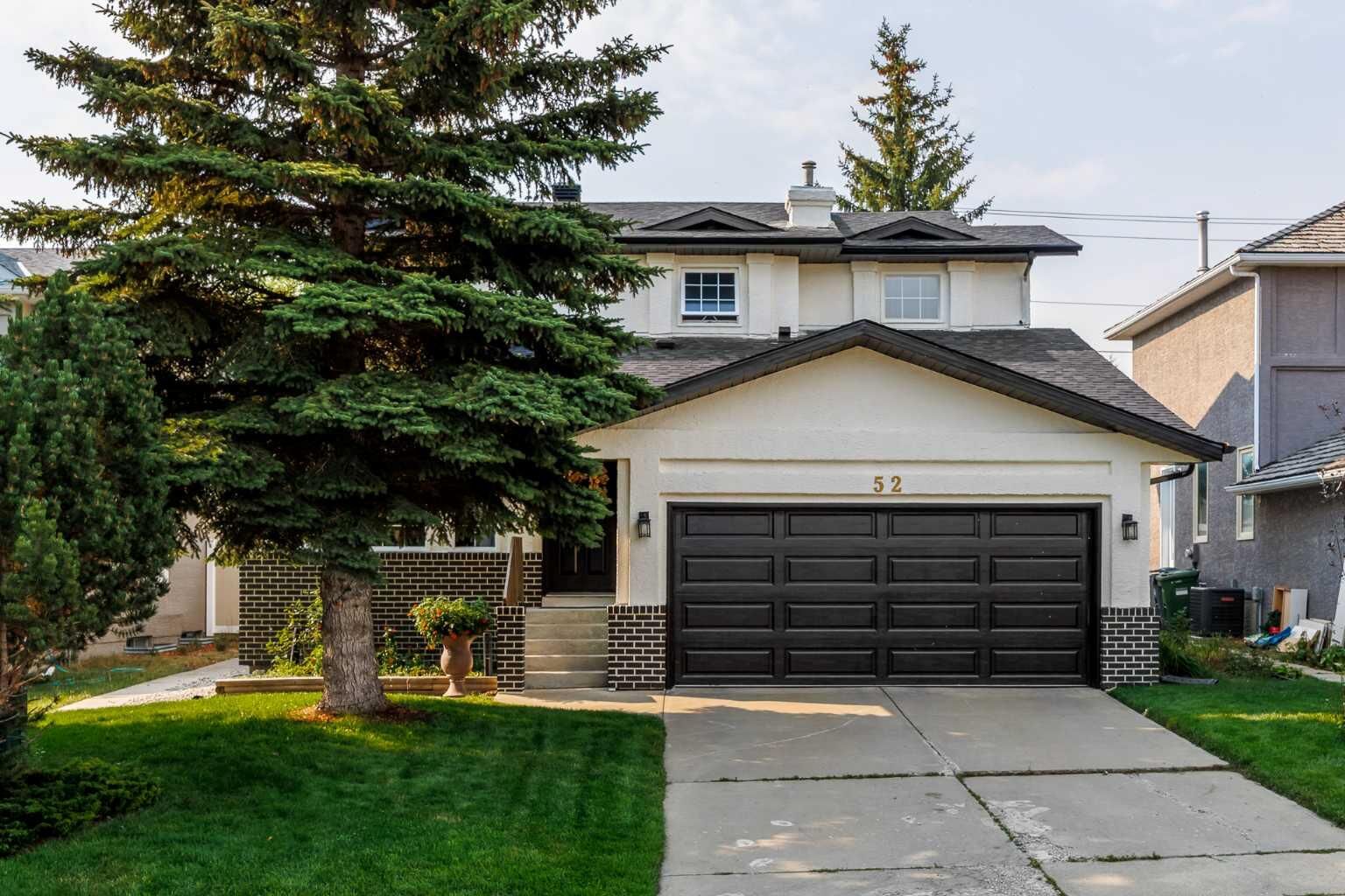 Property Photo:  52 Shawnee Way SW  AB T2Y 2V4 