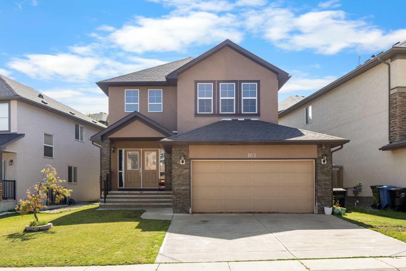 Property Photo: 162 Sherwood Hill NW AB T3R 1P7