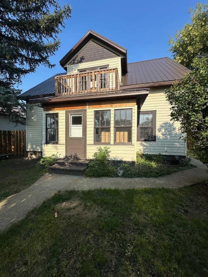 Property Photo: 123 3 Street E AB T1R 0C9