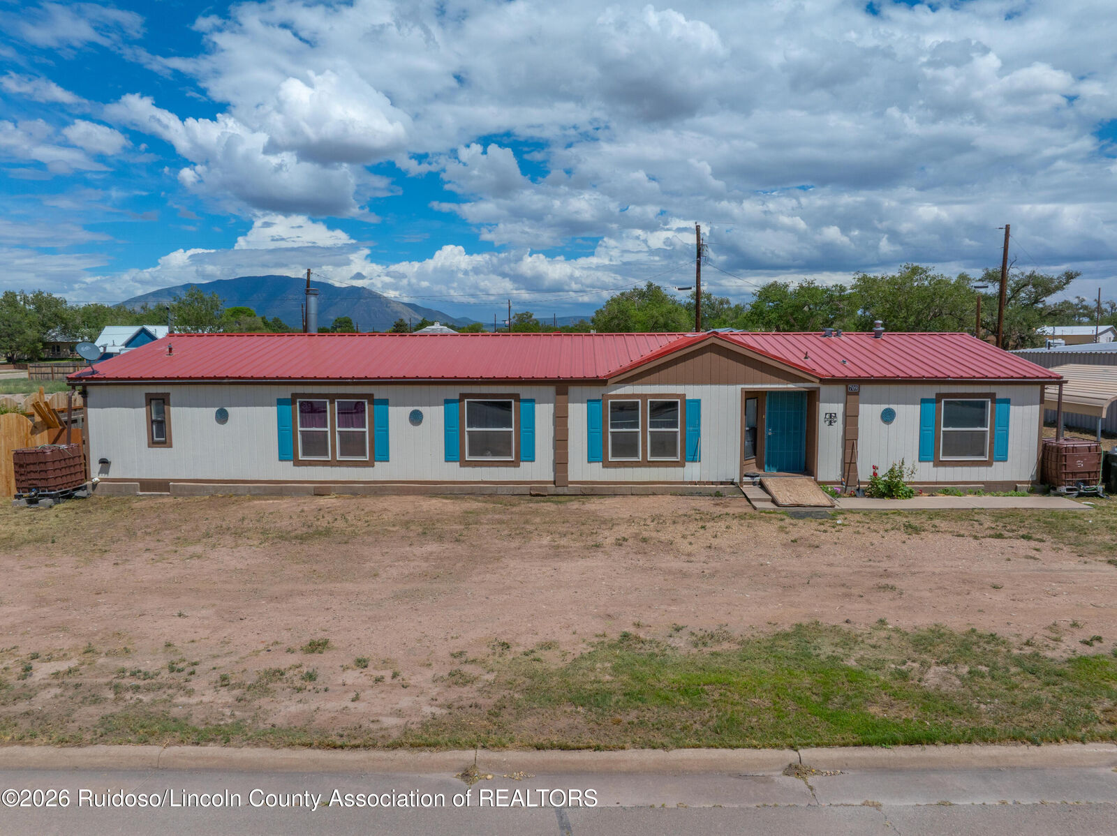 Property Photo: 709 & 711 East Avenue NM 88301