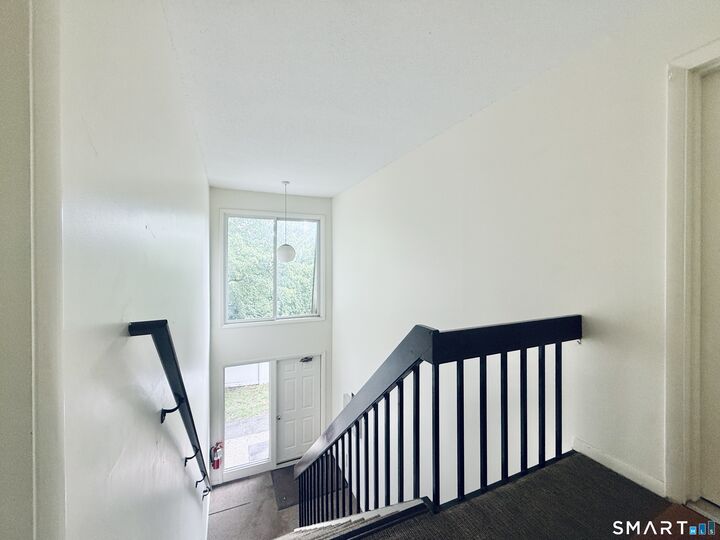 Property Photo: 180 Colonial Road B4 CT 06906