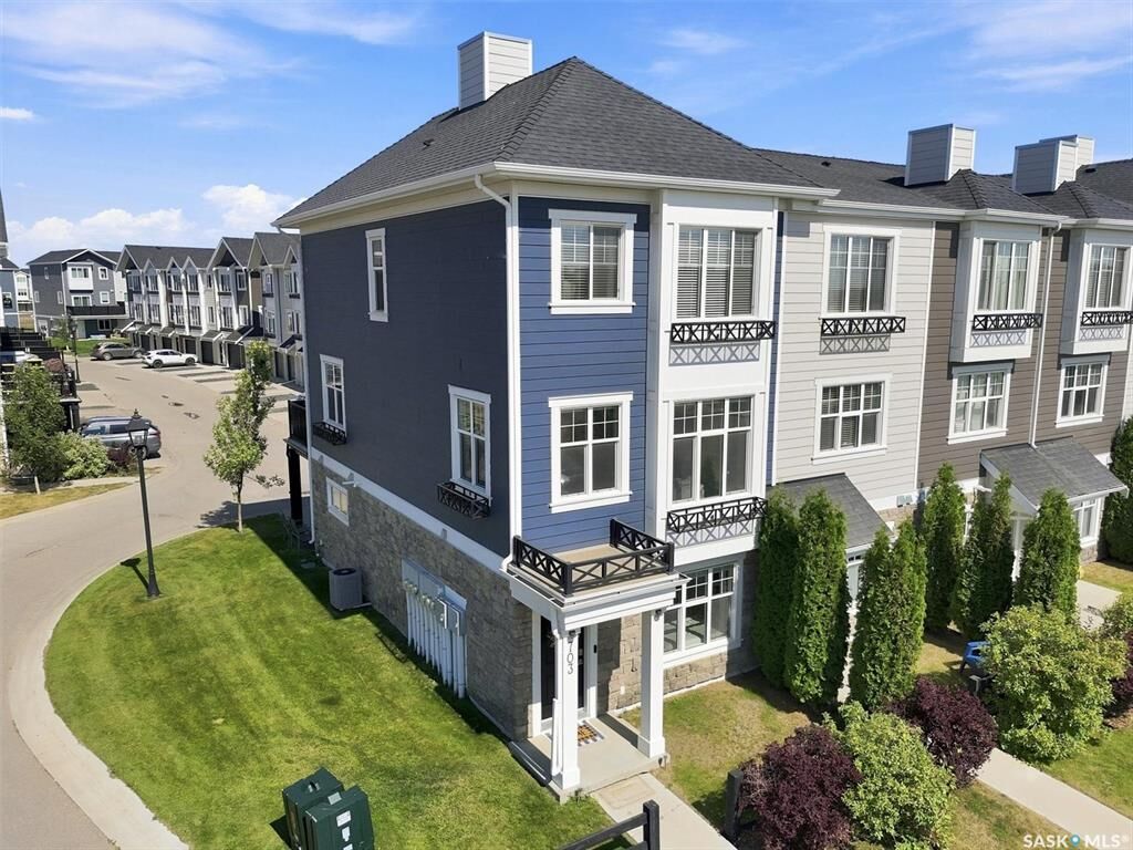 Property Photo: 703 Meadows Boulevard SK S7V 0L3