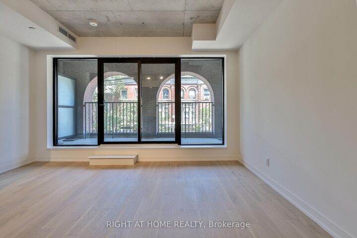 Property Photo:  761 Queen Street E 203  ON M4M 1H3 