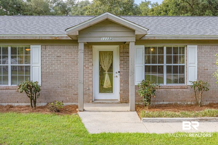 Property Photo: 11182 Wren Ave AL 36532