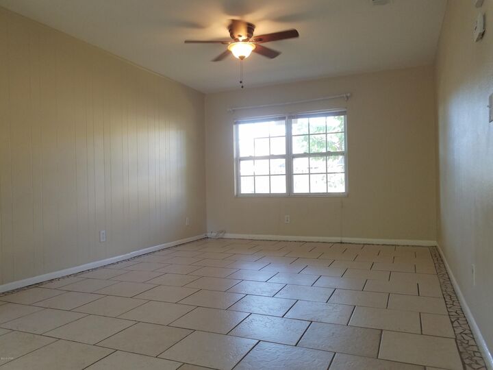 Property Photo:  7220 Poinciana Drive B  FL 32408 