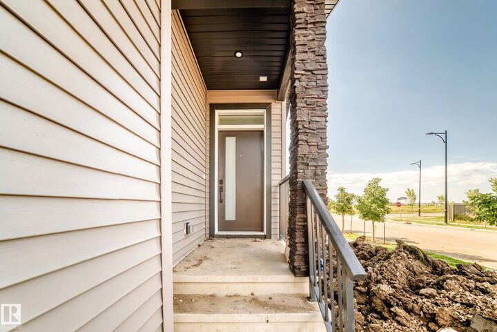 Property Photo: 1 Elliott Wynd AB T8L 0Z4