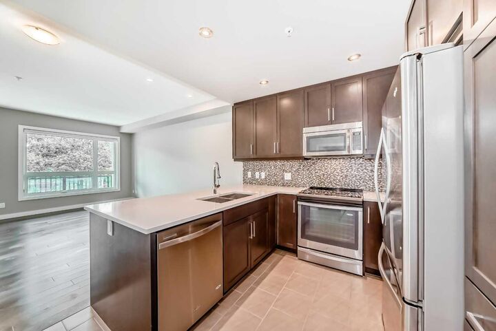 Property Photo:  145 Burma Star Road SW 107  AB T4C 8A8 