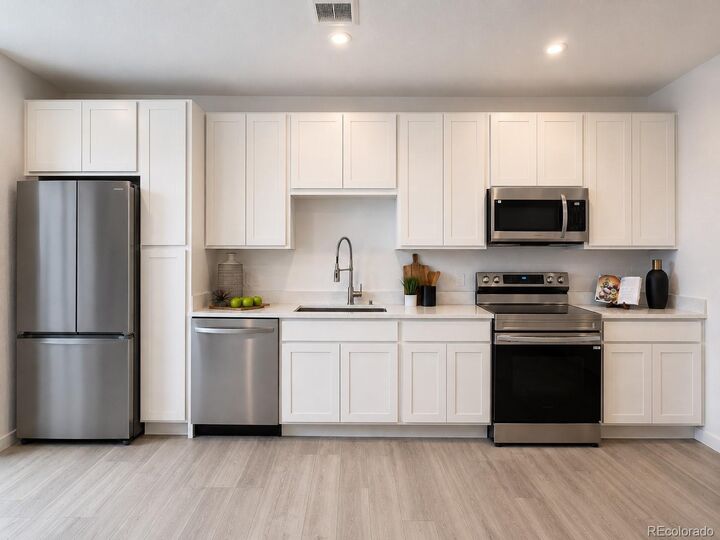 Property Photo:  1634 N Sheridan Boulevard 105  CO 80204 