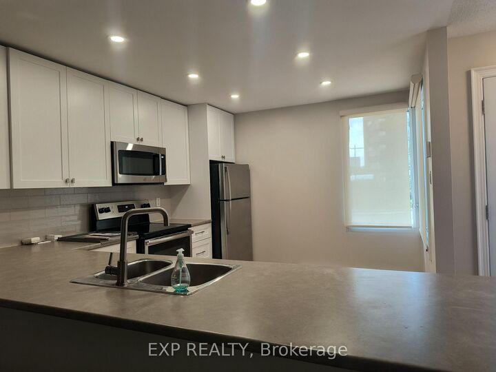Property Photo:  1310 Richmond Road 002  ON K2B 8L3 
