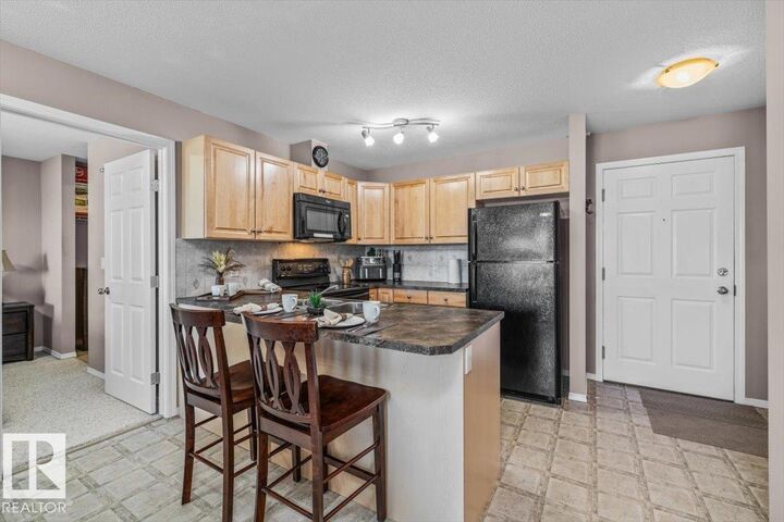 Property Photo: 4309 33 Street 412 AB T7Z 0C4