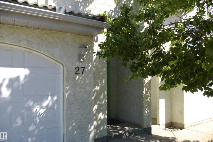 Property Photo: 9505 176 Street NW 27 AB T5T 5Z4