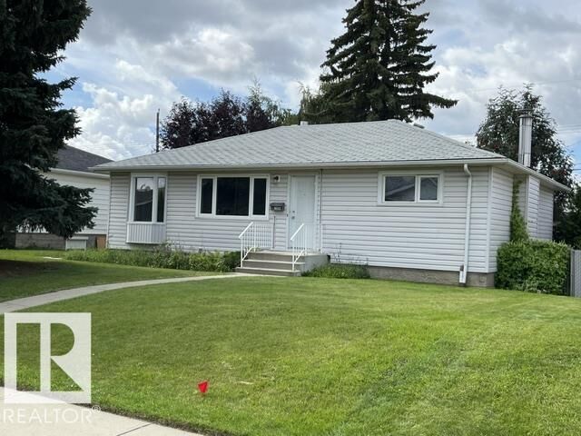 Property Photo: 10332 47 Street NW AB T6A 1Z7