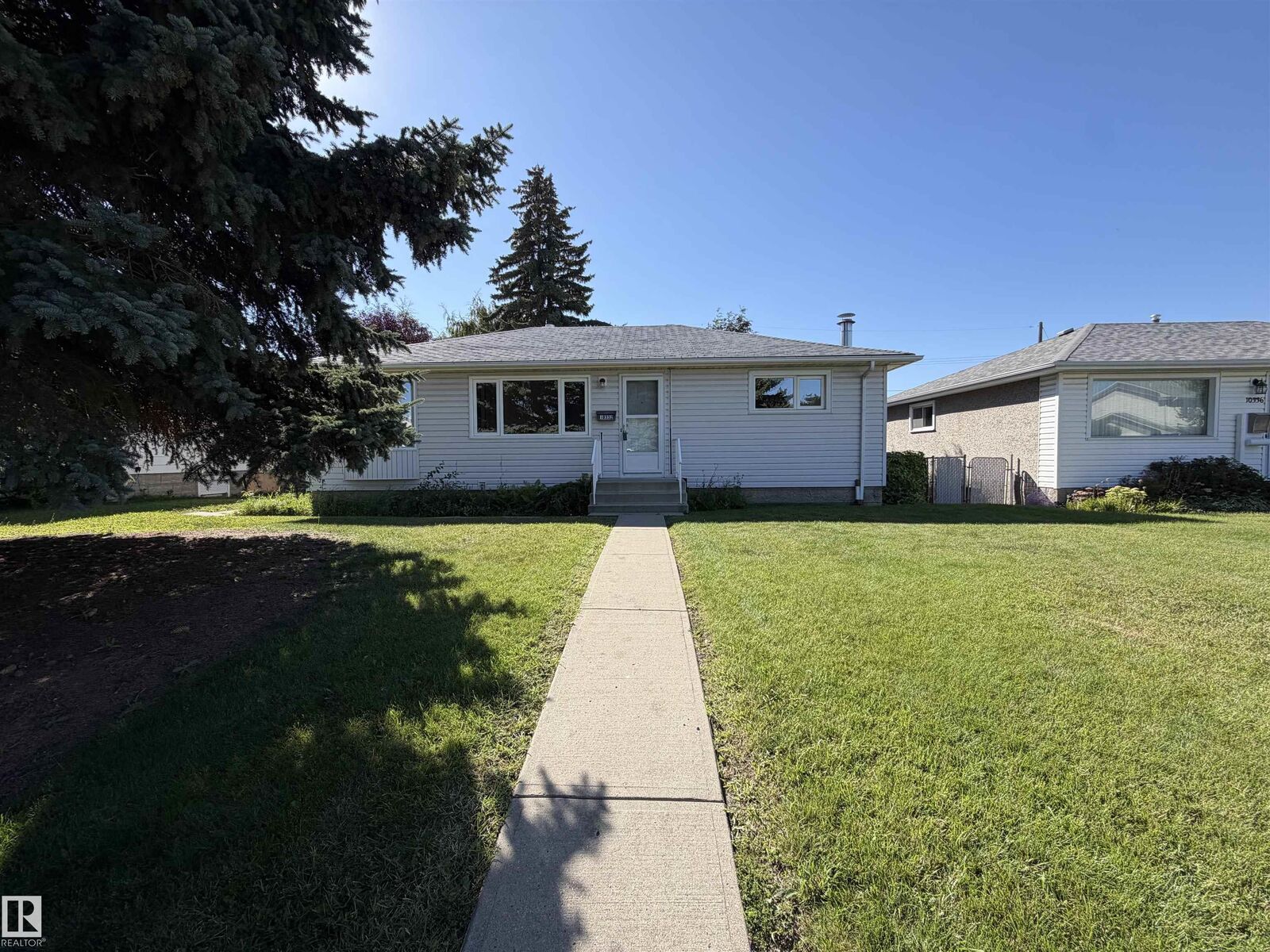 Property Photo: 10332 47 Street NW AB T6A 1Z7