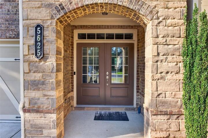 Property Photo:  5625 Turnbridge Pass  GA 30040 