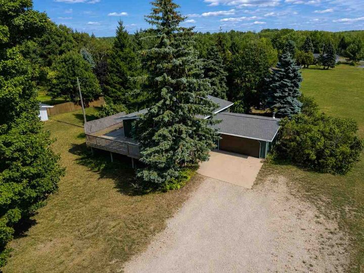 Property Photo:  6090 US 31 South  MI 49720 