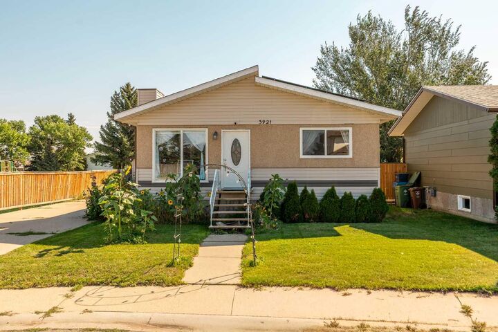 Property Photo: 3921 Harmony Place AB T1G 1A2