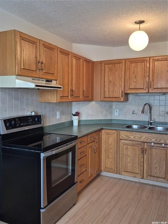 Property Photo: 3220 33rd Street W 102 SK S7L 6K3