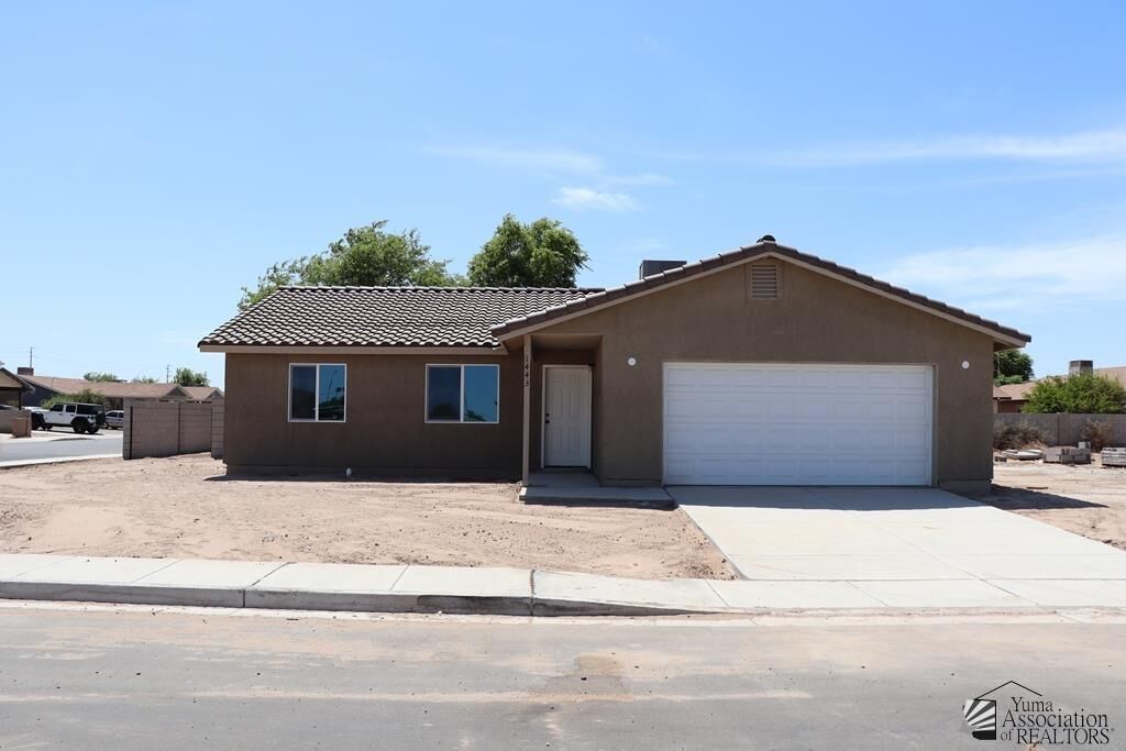Property Photo: 1348 S Mendota Ave AZ 85350