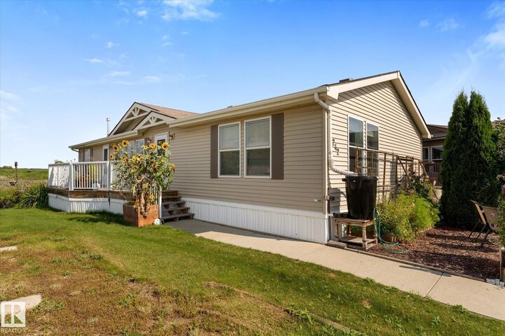 Property Photo:  1242 53222 Range Road 272  AB T7X 4K4 