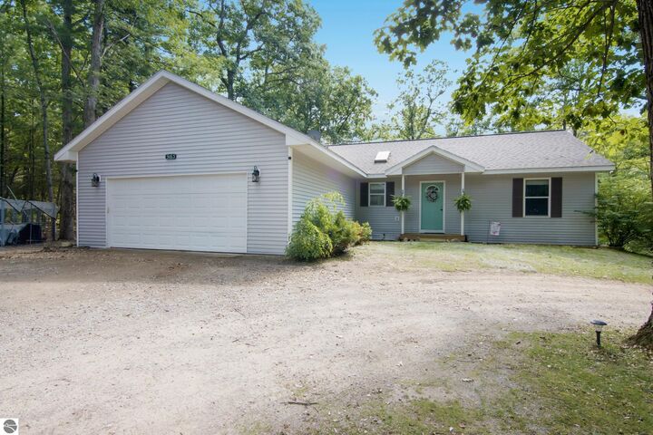 Property Photo:  9163 Youker Road  MI 49637 