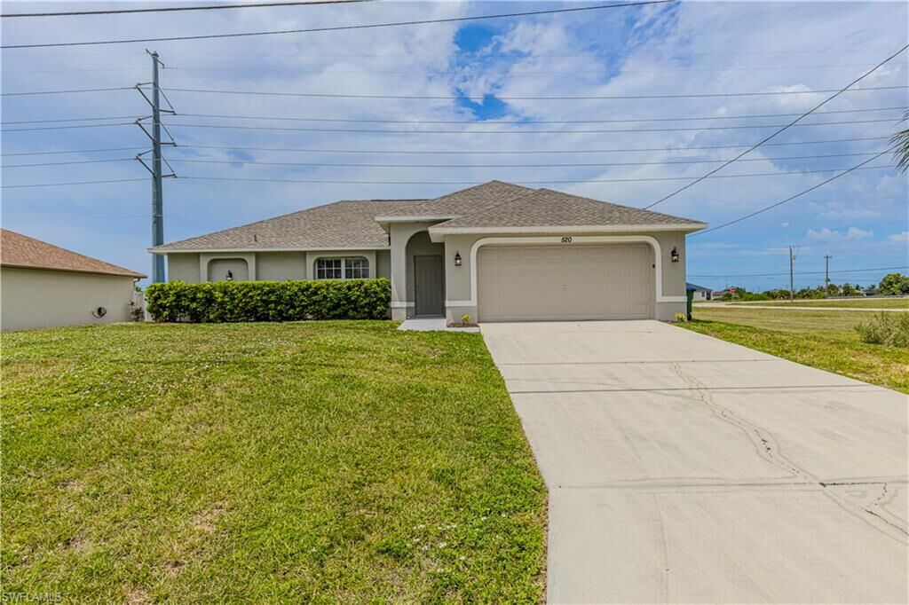 Property Photo:  520 NW 24th Ave  FL 33993 