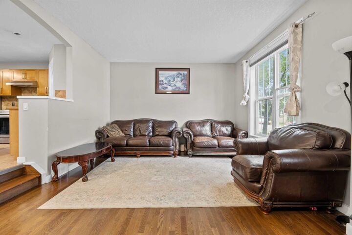 Property Photo:  303 Saddlebrook Way NE  AB T3J 0B4 