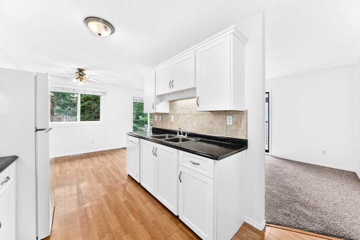 Property Photo:  28 Woodland Drive  AB T4L 1V1 