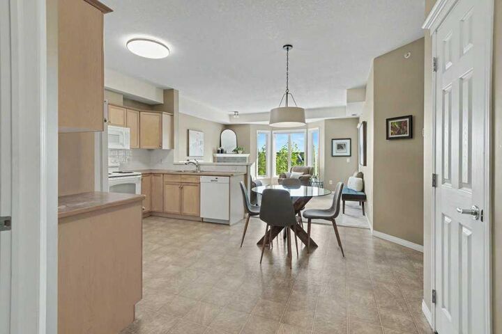 Property Photo:  15 Everstone Drive SW 443  AB T2Y 5B5 