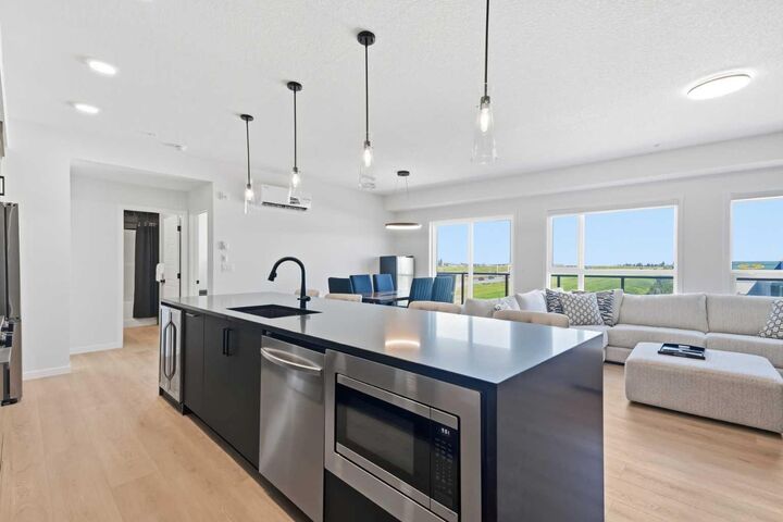 Property Photo: 20295 Seton Way SE 3409 AB T3M 0M2
