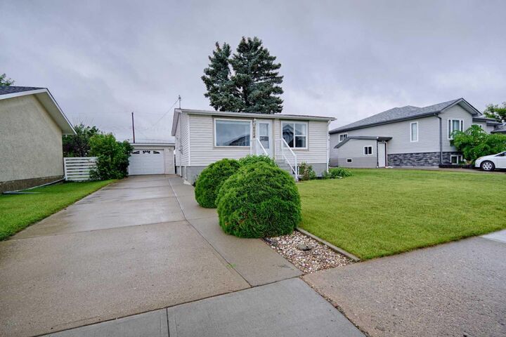 Property Photo:  6014 52 Street  AB T1G 1K4 