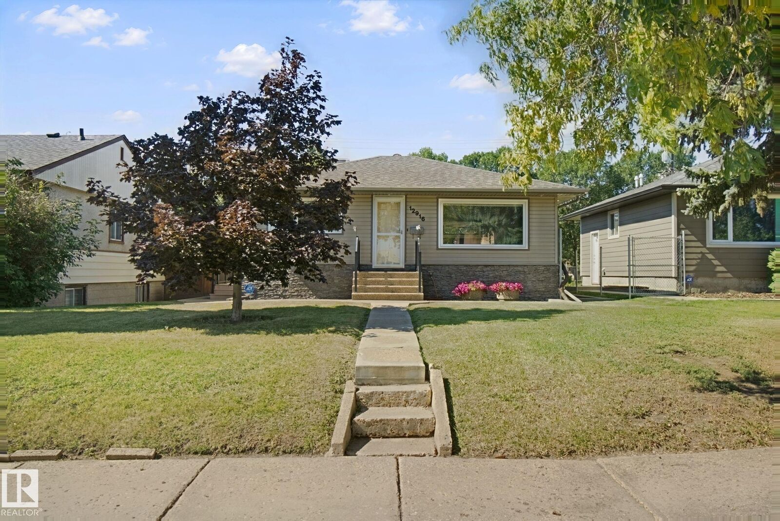 Property Photo:  12916 63 Street NW  AB T5A 0W3 