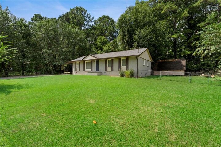 Property Photo:  8839 Channing Drive  GA 30238 
