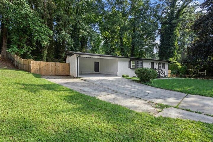 Property Photo:  4720 Shoshonee Trail  GA 30349 