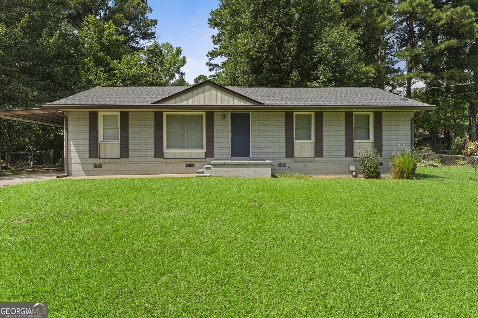 Property Photo: 8839 Channing Drive GA 30238