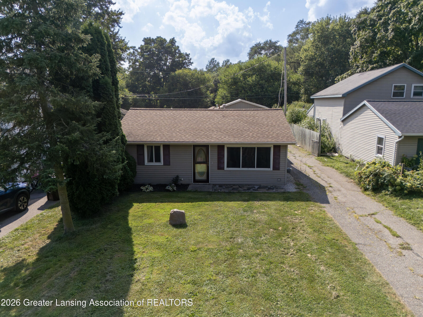Property Photo: 38 S Aurelius Road MI 48854