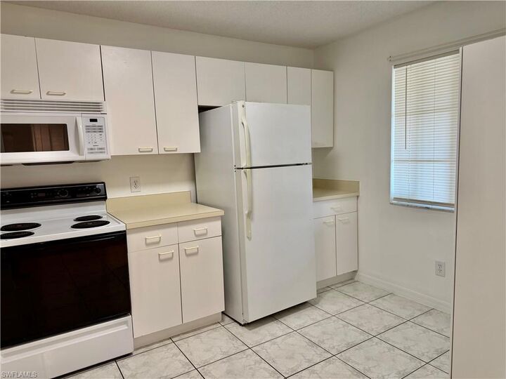 Property Photo:  7755 Jewel Ln 103  FL 34109 