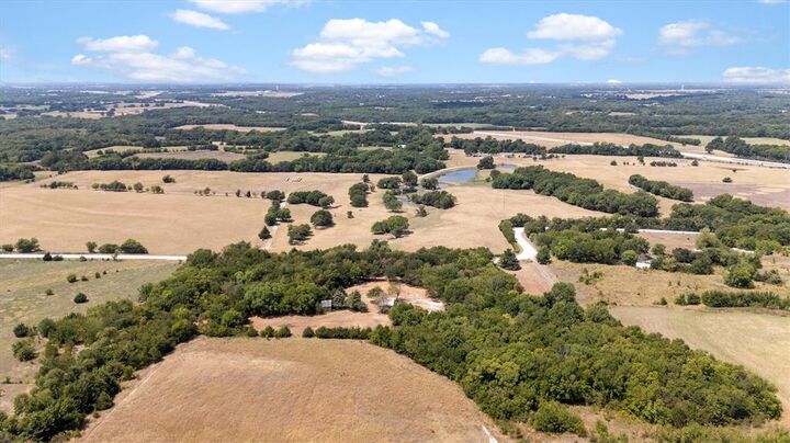 Property Photo: 9999 County Road 936 TX 75409