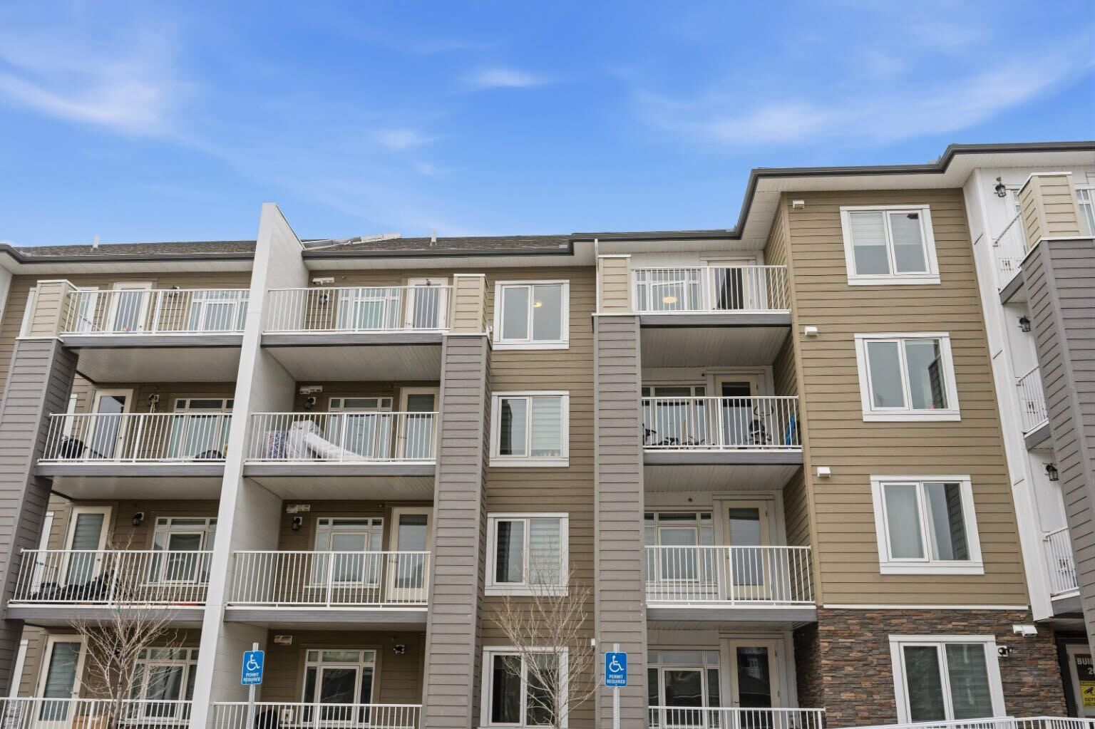 Property Photo:  6118 80 Avenue NE 2402  AB T3J 0S6 