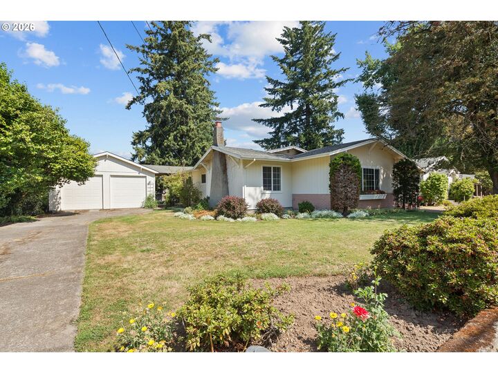 Property Photo:  10737 NE Shaver St  OR 97220 