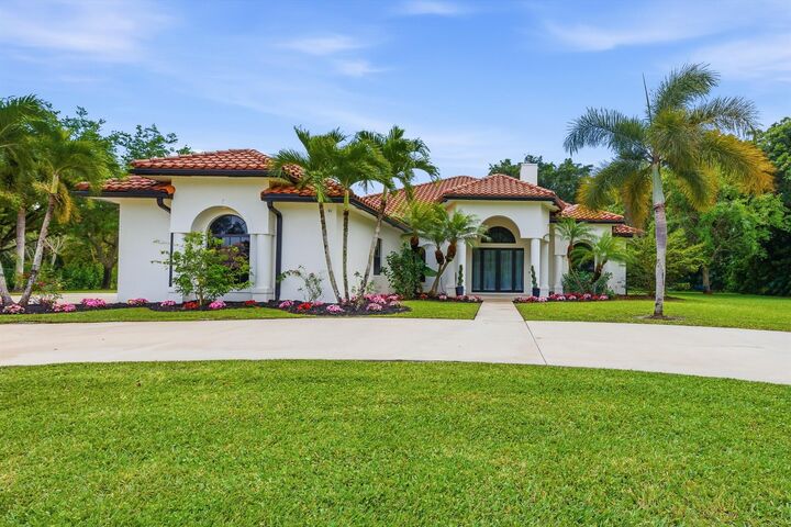 Property Photo: 8717 Estate Drive FL 33411