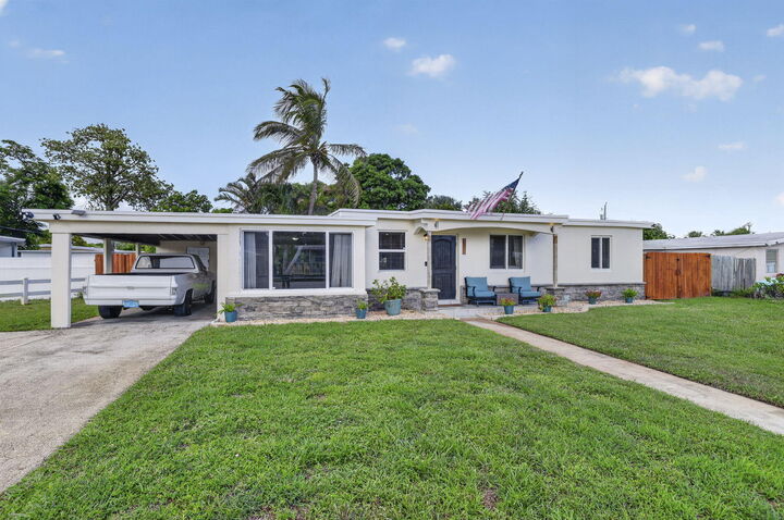 Property Photo: 1633 NE 51st Court FL 33064