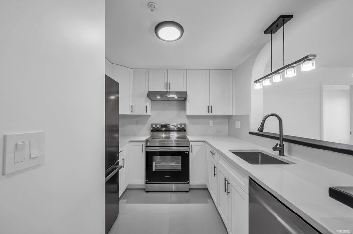 Property Photo:  6833 Village Green 306  BC V5E 4M1 